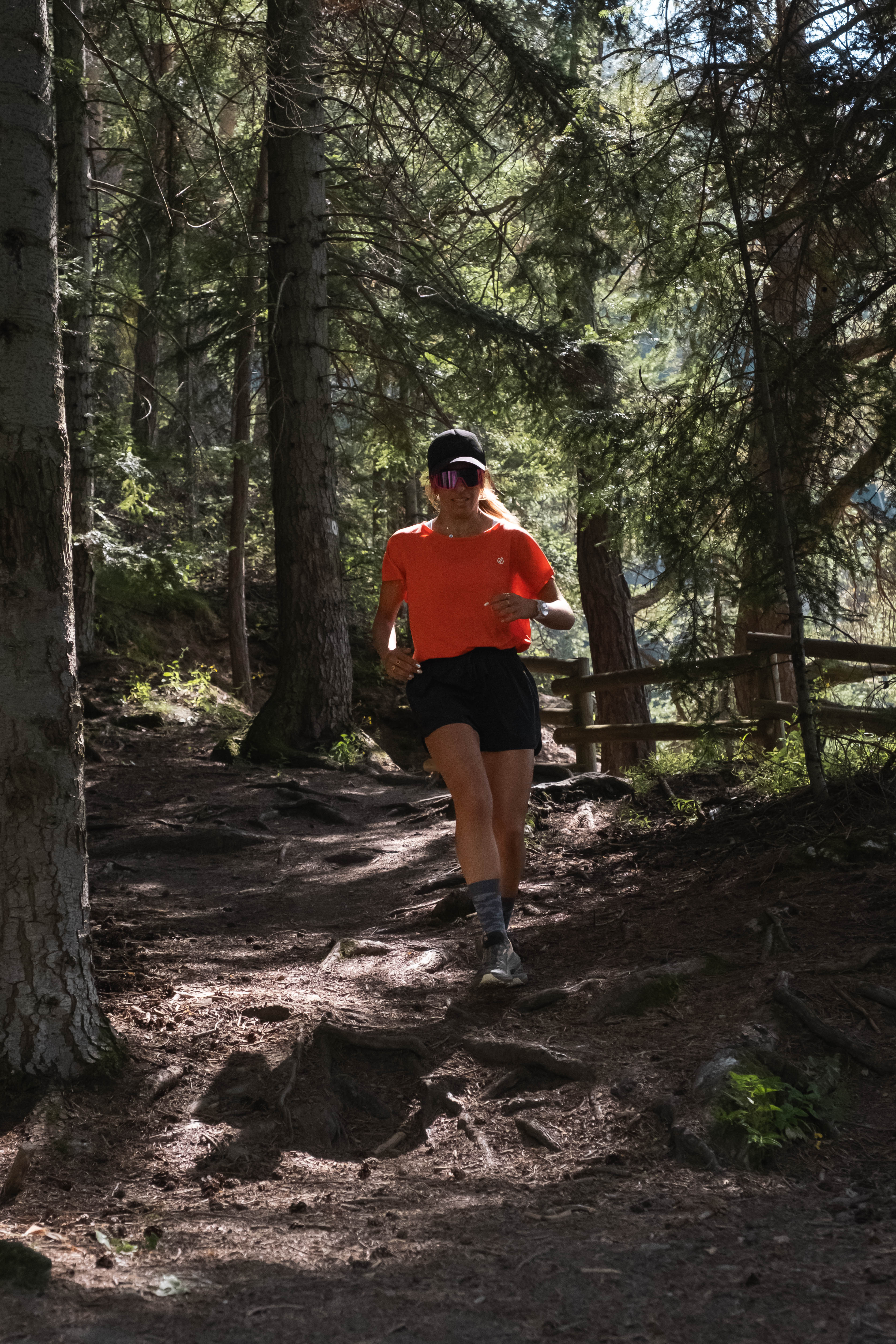 Woman running in the forest