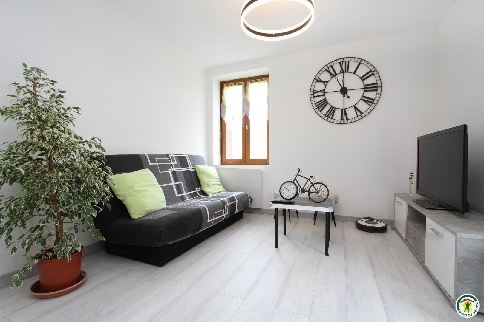 Le coin salon et espace TV