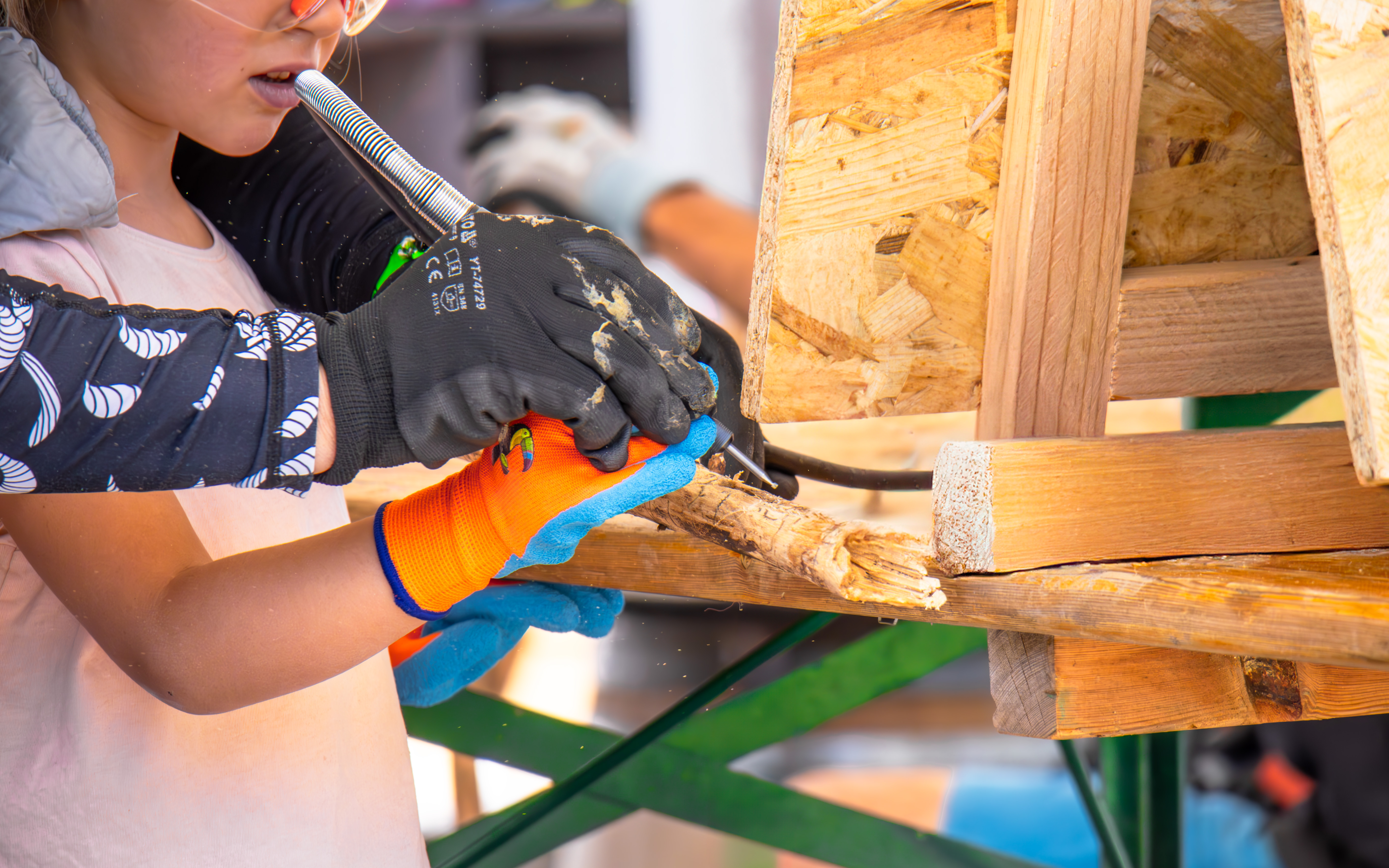 Child carving his stick
