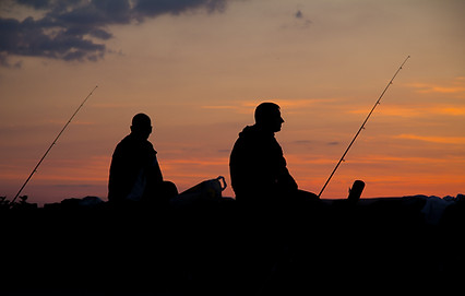 Pêcheurs au coucher du soleil