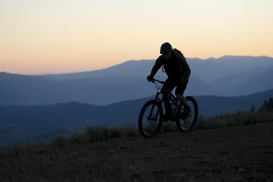 Image young-adult-using-electric-bike-country-side