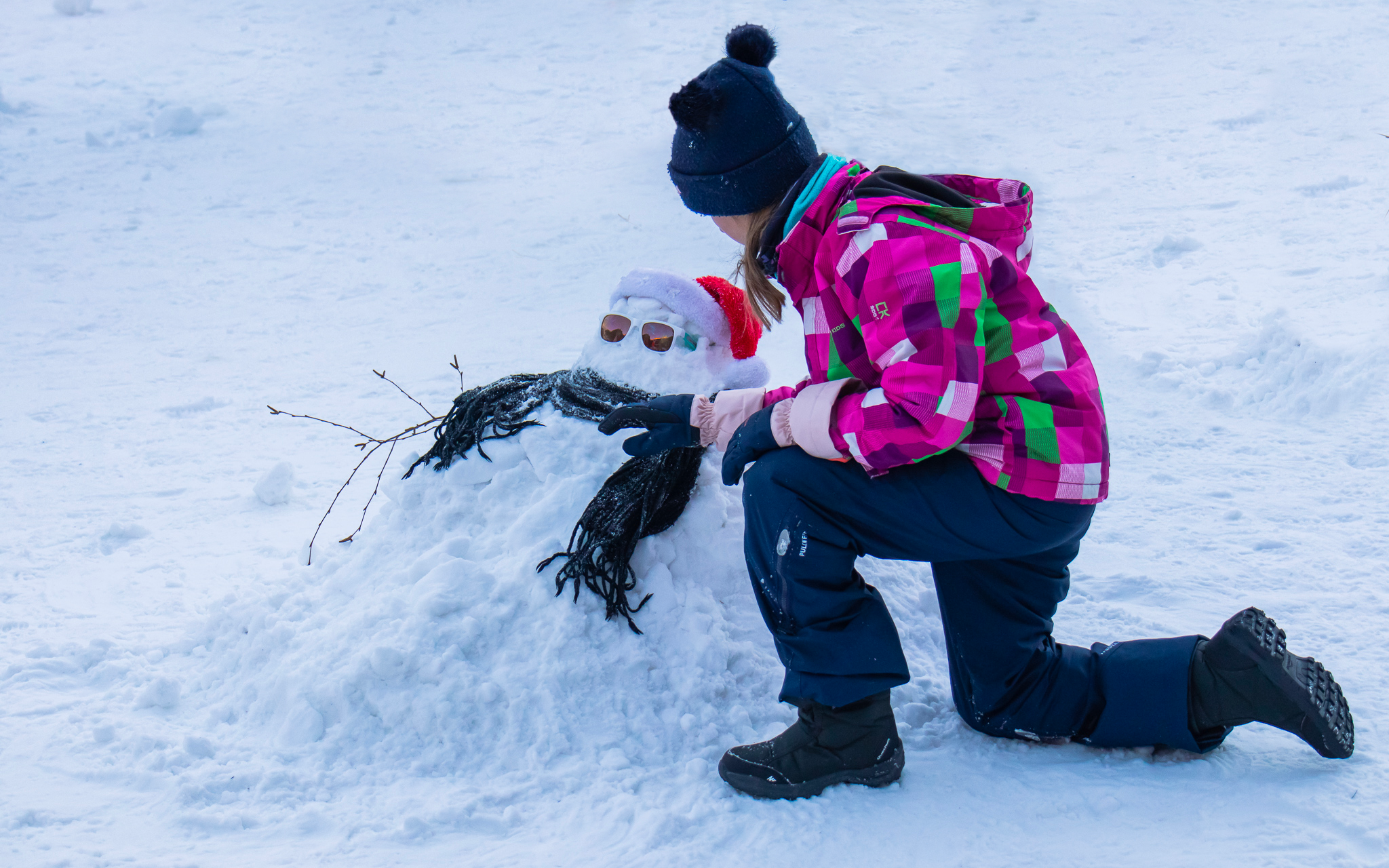 Concours de bonhomme de neige avec vos propres accessoires (écharpe, carotte, lunettes, etc.)