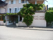 photo façade hôtel oasis