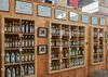 L'Échoppe des Saveurs - Lapalisse Boutique - Rayonnages avec huiles Ⓒ Patrick André - 2019