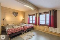 Chambre double : 2 lits simples ou un lit double
côté montagne