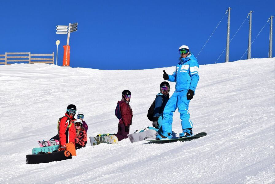 Cours de snowboard collectif