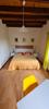 La chambre avec son grand lit (160x200) Ⓒ Gîtes de France