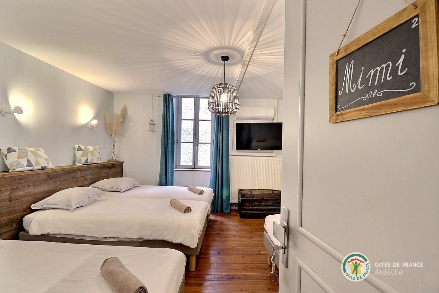 Chambre Mimi avec cinq lits 90