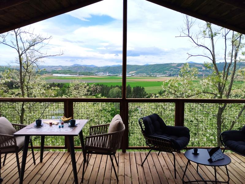Terrasse vue golf Cabane hôtelière