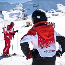 élève et moniteur en cours de ski 3ème étoile