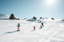 Famille en ski sur les pistes de Plaine Dranse