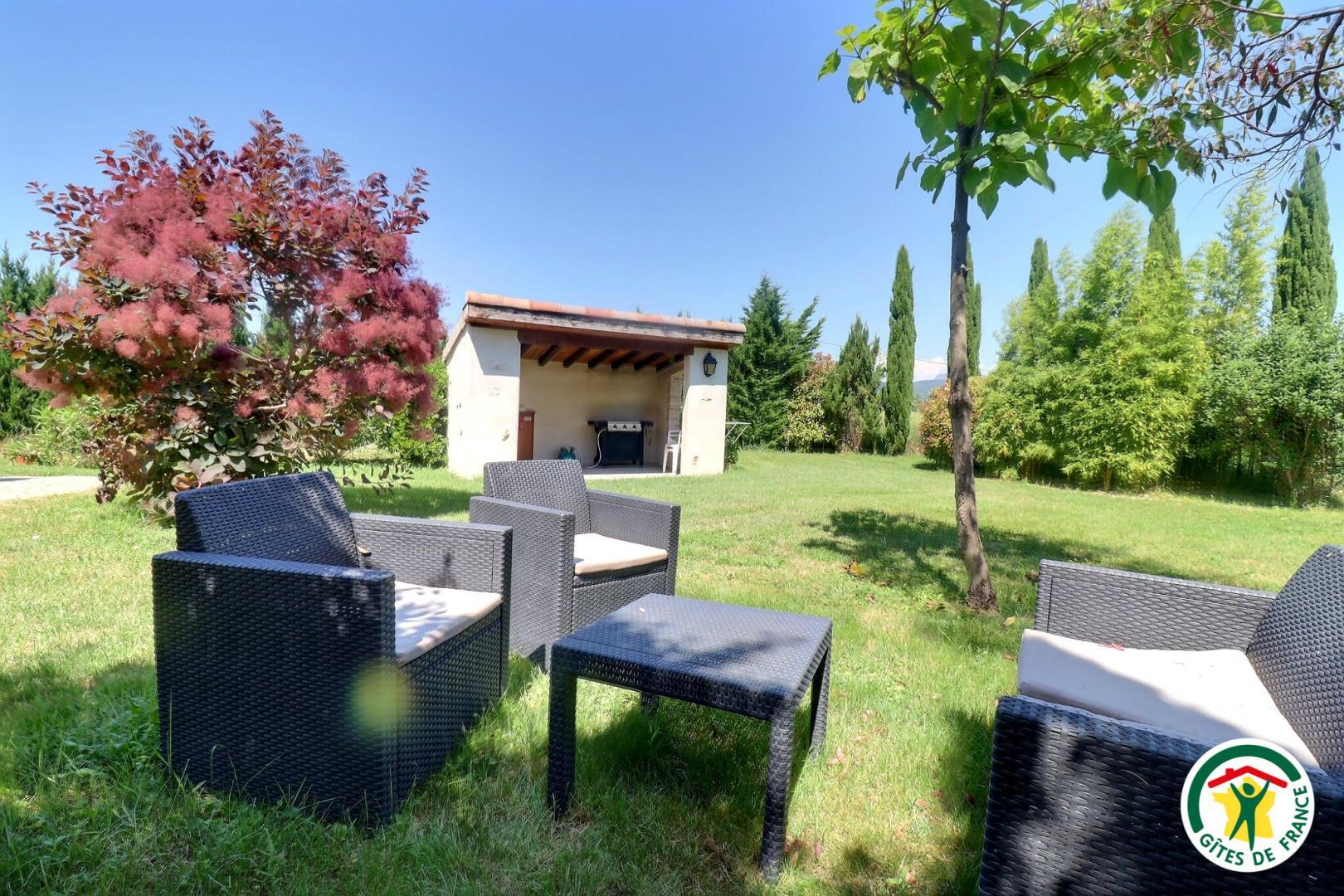jardin privatif avec salon de détente