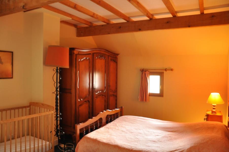 chambre parents lit double + lit simple