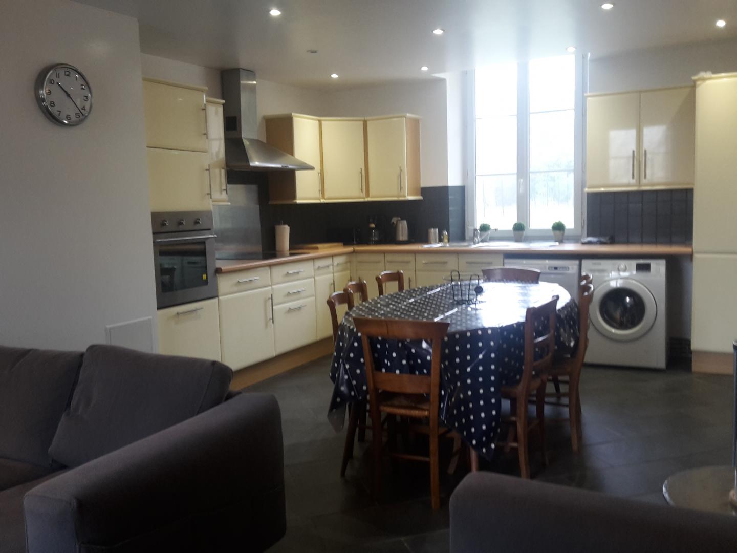 Espace cuisine/repas ouvert sur séjour