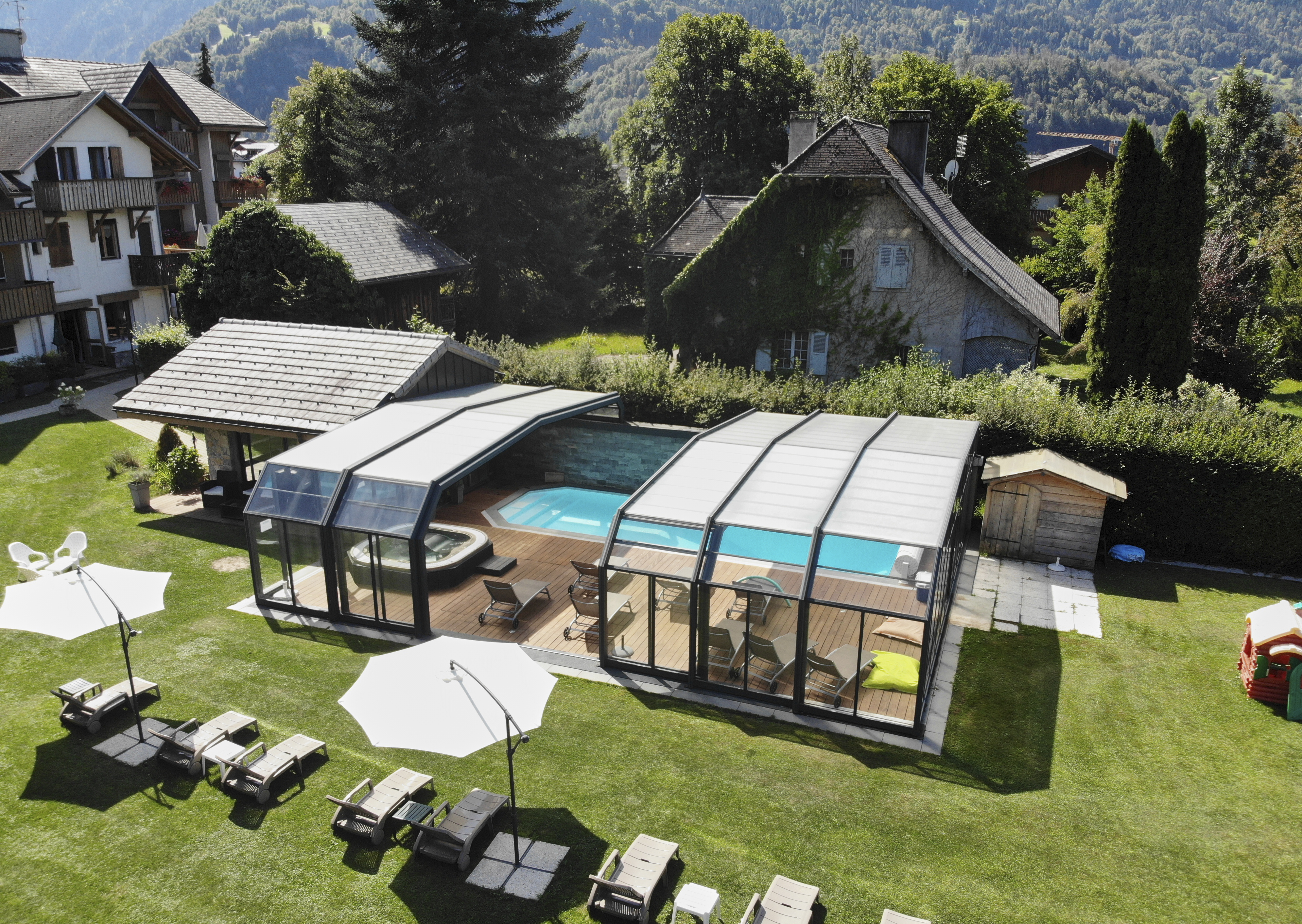 View of the heated swimming pool from outside