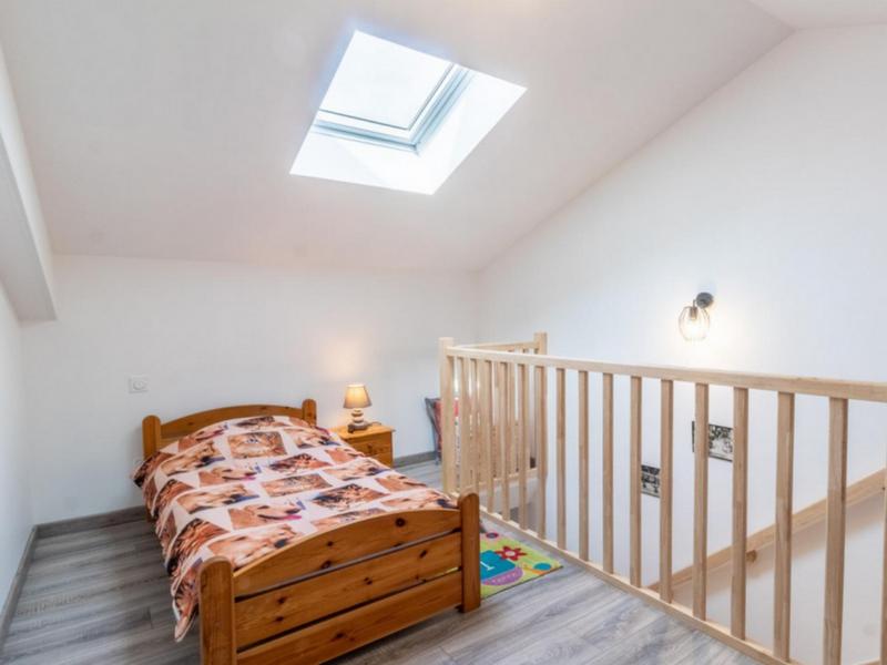 Chambre mansardée à létage