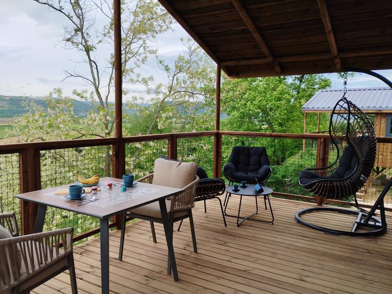 Terrasse vue golf Cabane hôtelière