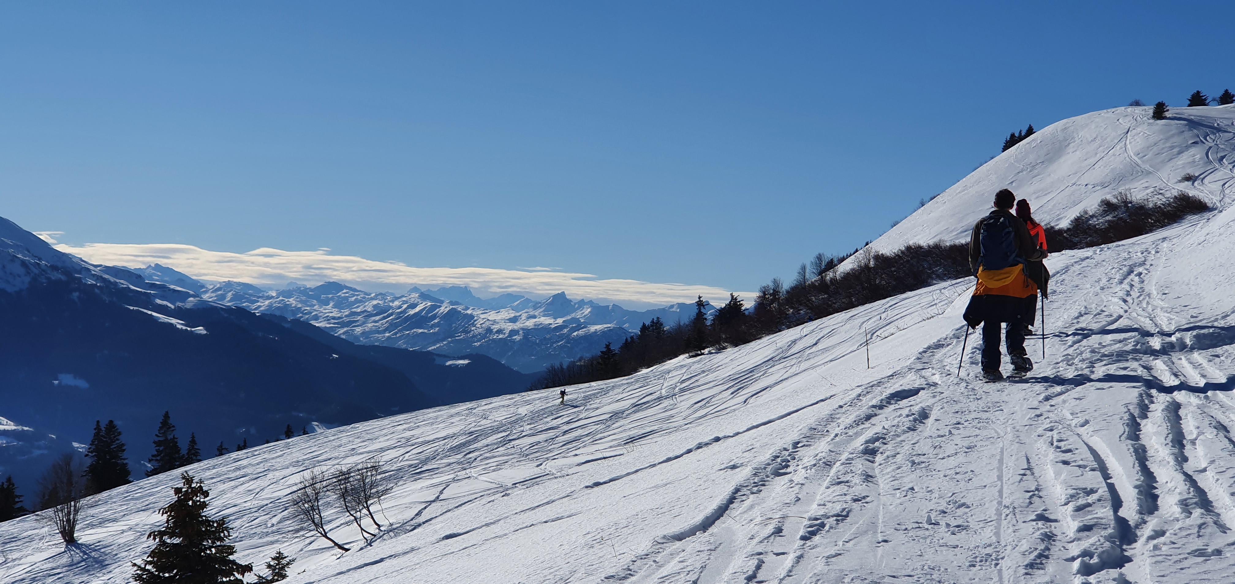 People hiking in the winter activity area at Granier