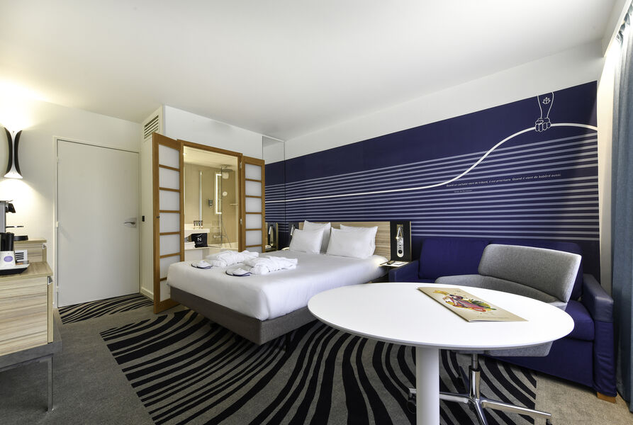 Chambre avec grand-lit double et canapé-lit 1 personne