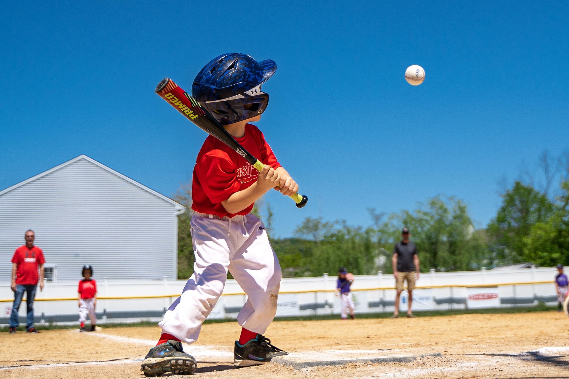Child playing baseball