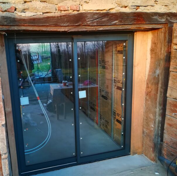 Baie vitrée installée par Yannick Montfollet