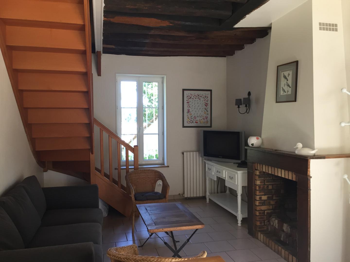 coin salon/TV
Canapé 3 places+2 fauteuils