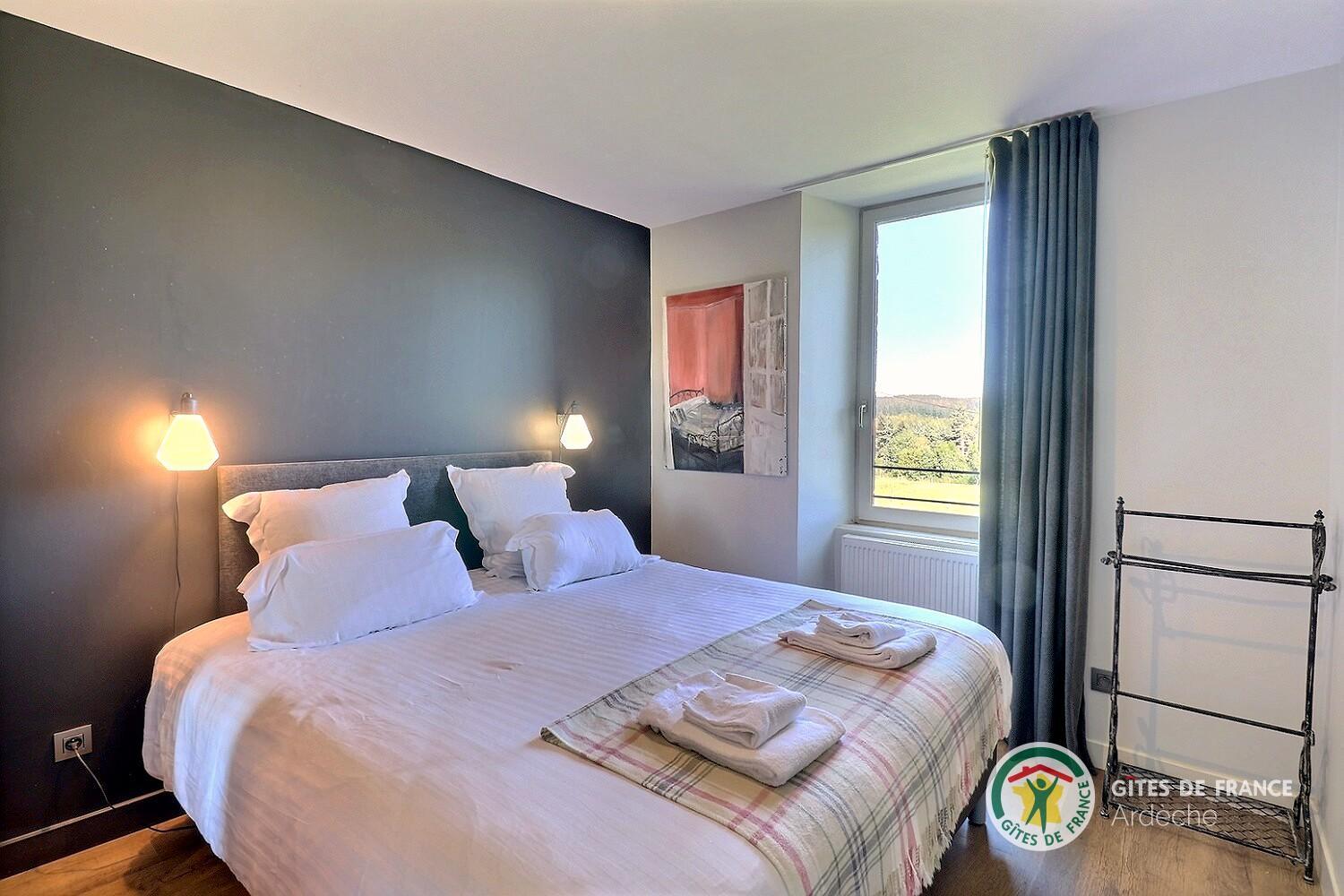 Deuxième chambre au niveau 1 avec deux lits 90 (modulables lit 180)