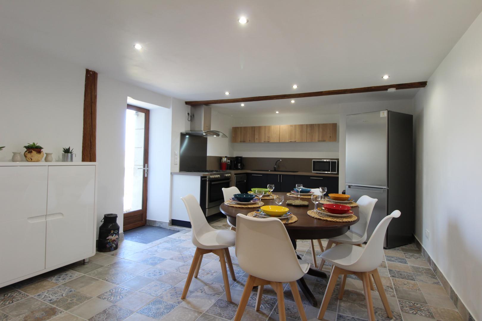 Séjour au rez de chaussée avec cuisine équipée